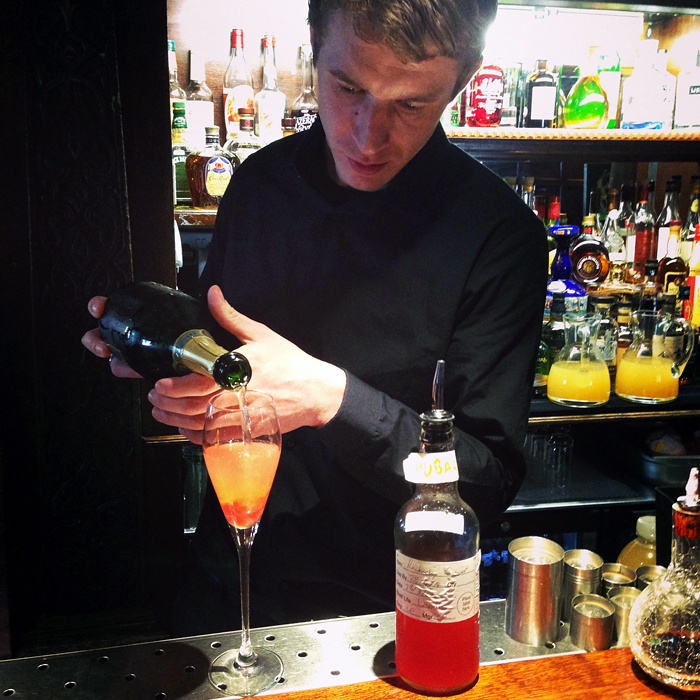 Poached rhubarb and vanilla champagne cocktail at The Hinds Head. Photo: Kim Laidlaw