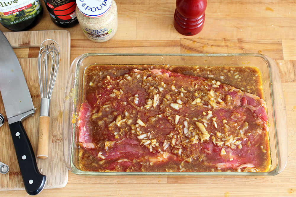 After pricking the steak with a fork on both sides place it in prepped marinade. Photo: Wendy Goodfriend