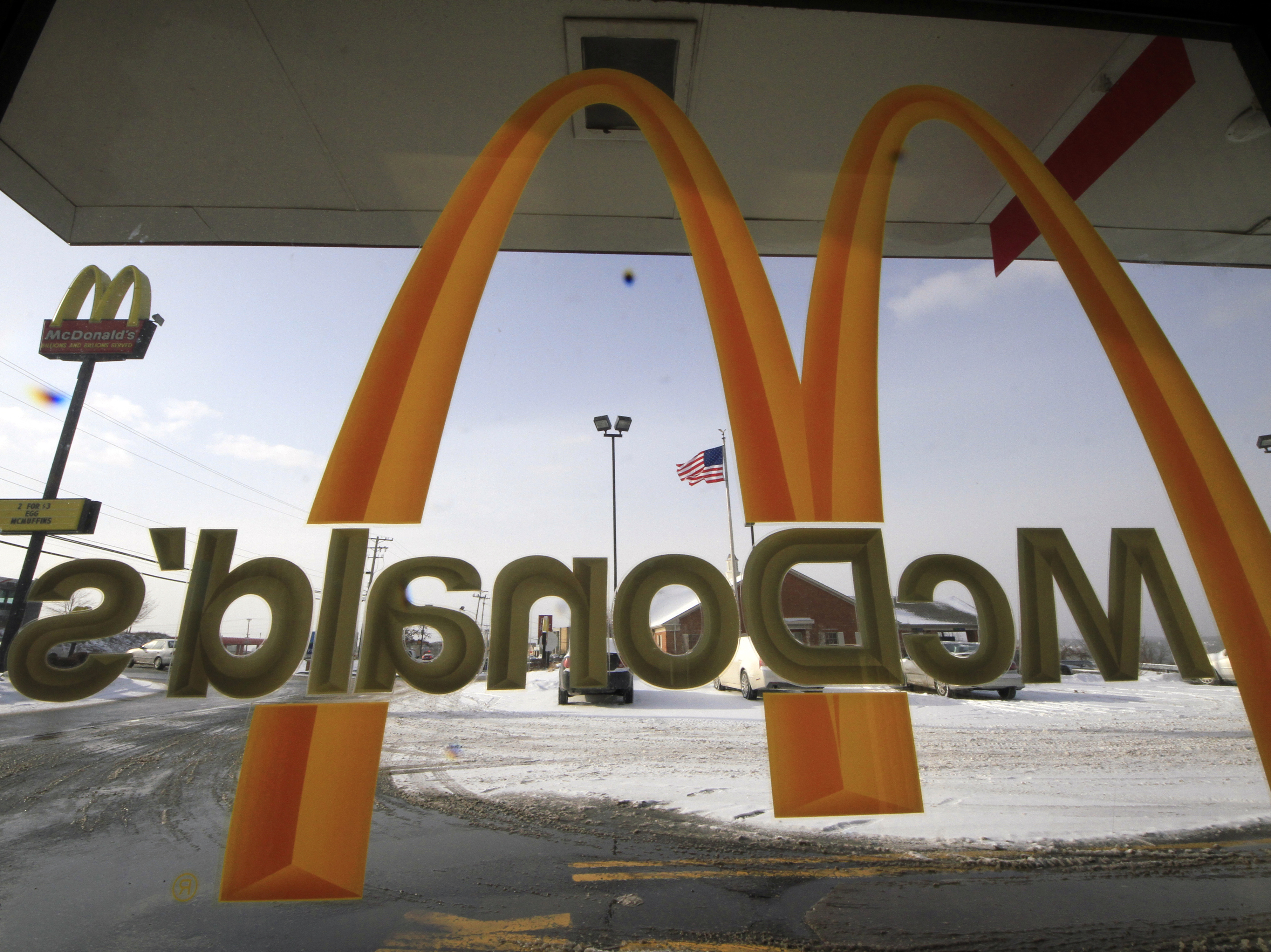The National Labor Relations Board says McDonald's shares responsibility for how workers are treated at its franchised restaurants. Photo: Gene J. Puskar/AP