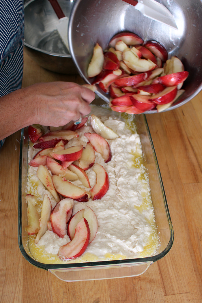 Spoon the cobbler batter into the prepared baking dish, spreading it as evenly.Top with the fruit. Photo: Wendy Goodfriend