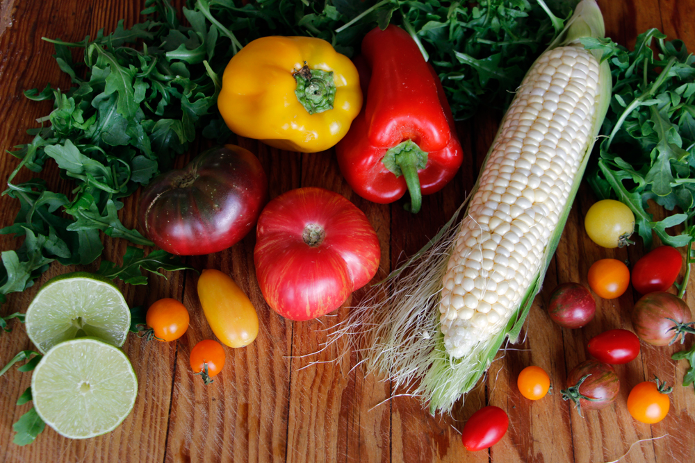 Ingredients for Grilled Corn, Sweet Peppers, Heirloom and Cherry Tomato, Feta, Arugula Salad. Photo: Wendy Goodfriend
