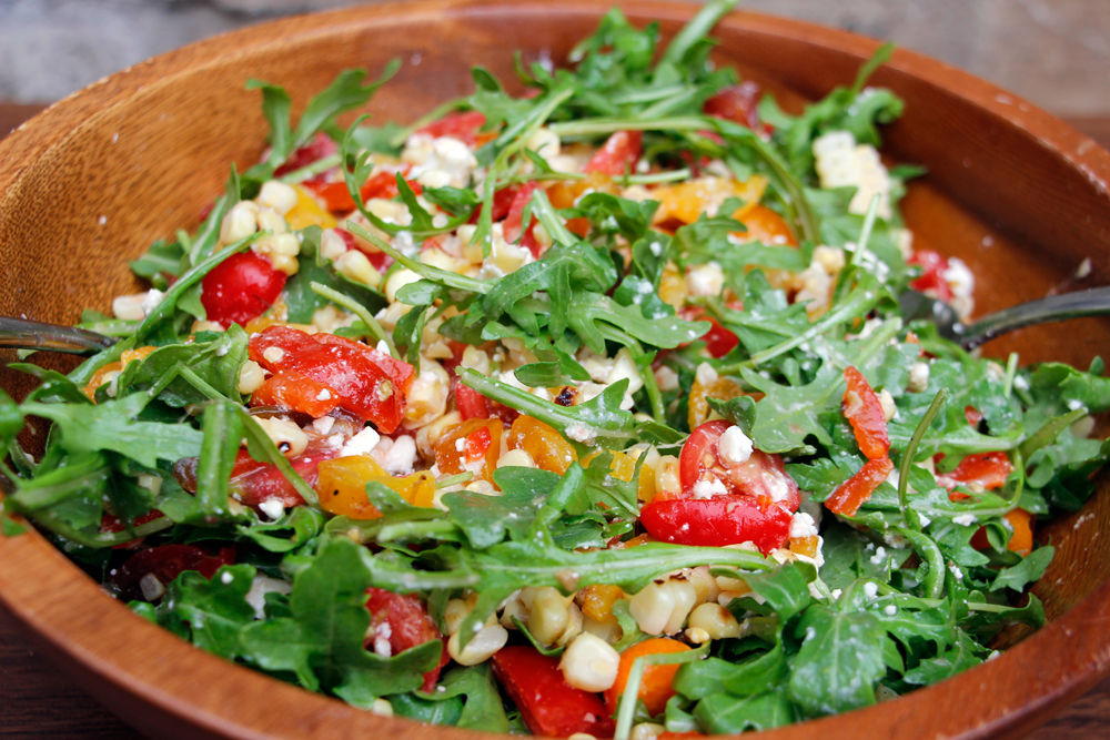 Grilled Corn, Sweet Peppers, Heirloom and Cherry Tomato, Feta, Arugula Salad. Photo: Wendy Goodfriend