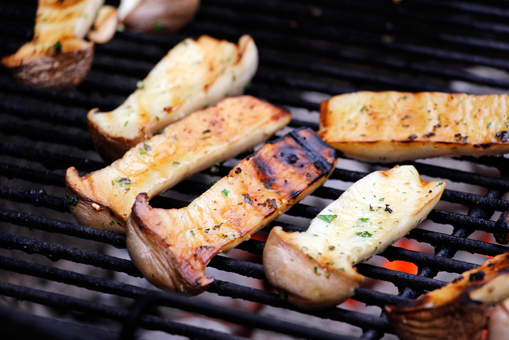 Grill the mushrooms, turning frequently, until tender and browned, 6–8 minutes. Photo: Wendy Goodfriend