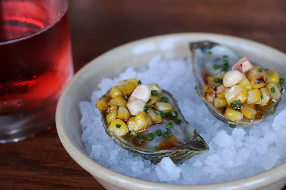 Marin Atlantic oysters with roasted corn and bay leaf. Photo: Kim Westerman