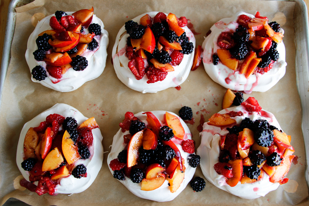 Crispy-Chewy Vanilla Pavlovas with Whipped Cream and Vanilla-Scented Nectarines and Berries. Photo: Wendy Goodfriend
