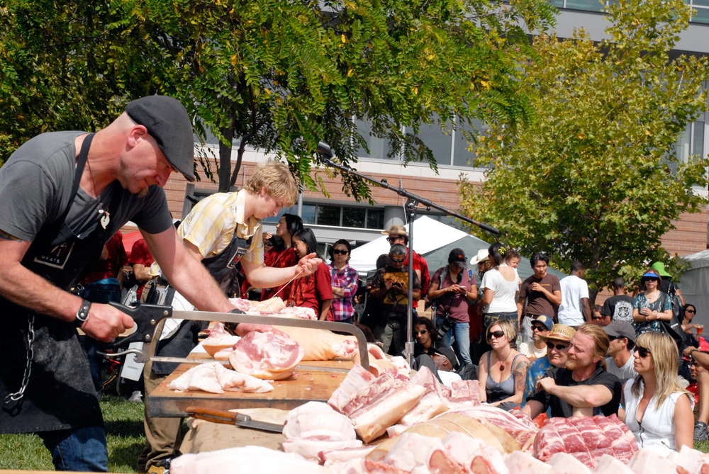 Dave the Butcher battles Daren King at 3rd Annual Flying Knives Pork Butchery Contest. Photo: Wendy Goodfriend