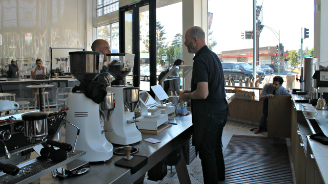 A barista talks to a customer at Blue Bottle's W.C. Morse location in Oakland. Photo: Shelby Pope 
