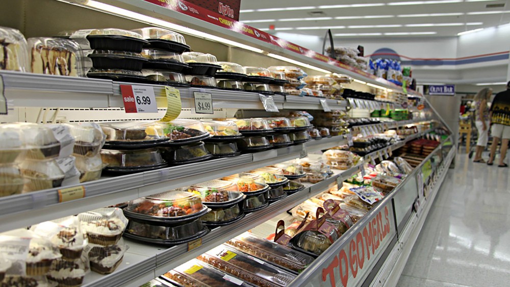 Ready-to-eat meals found in the prepared food aisle are a growing source of waste, as it is difficult to reuse meals that aren't sold but are fully cooked. Photo: Kristofor Husted/Harvest Public Media