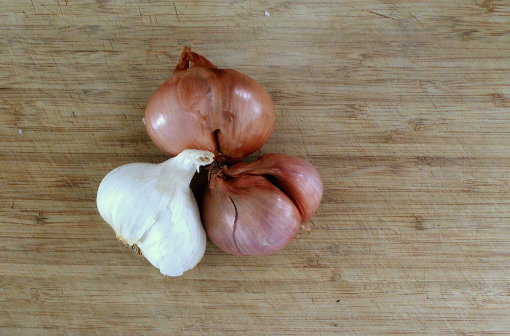 Shallots and garlic are the bass note of any curry paste. They are used in abundance — don’t be shy. Photo: Kate Williams