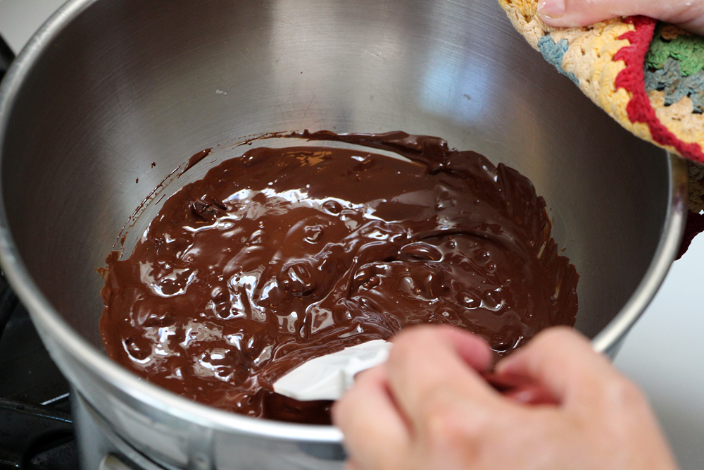 To make the frosting, place the chocolate in the top of a double boiler over (not touching) barely simmering water, and warm, stirring often, until melted. Photo: Wendy Goodfriend
