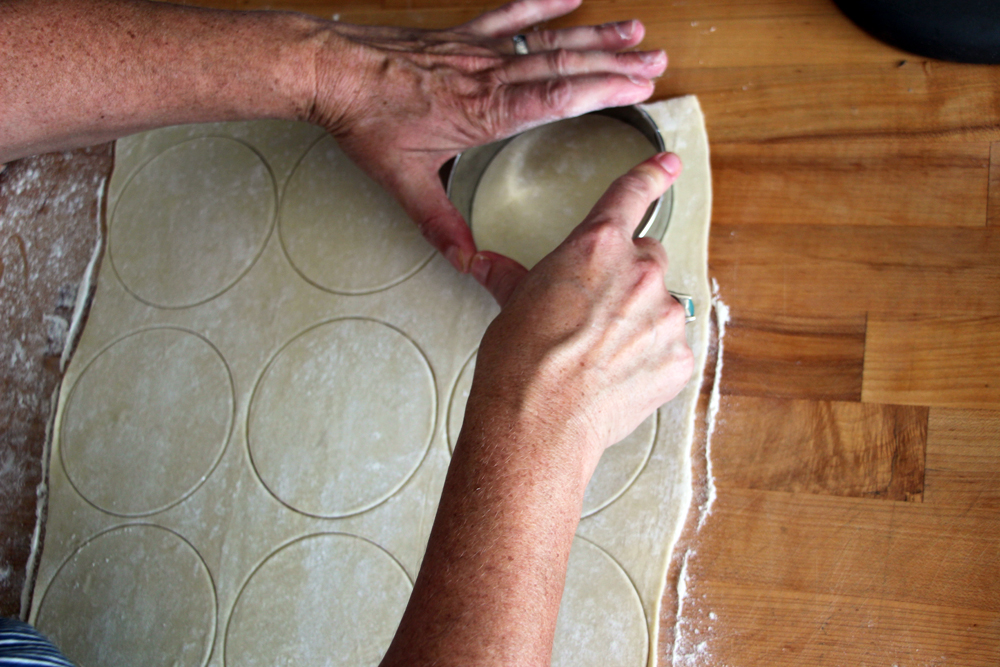 Using a 4-inch round biscuit cutter cut out 9 rounds. 