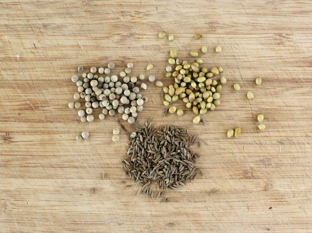 The “trinity” of curry paste spices is made up of whole cumin, coriander, and white peppercorns, which are toasted and ground before using. Additionally, I like to add fennel seeds and curry powder to my yellow curry and mustard seeds to my green curry. Photo: Kate Williams