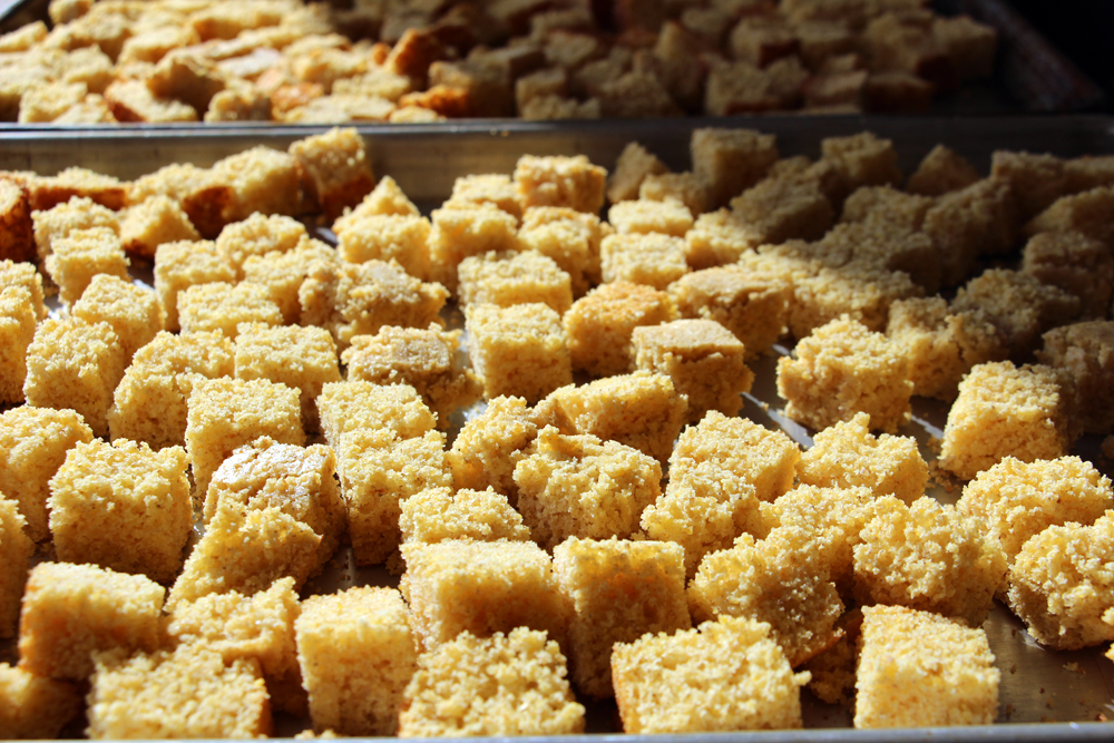 When ready to make the stuffing, cut the cornbread into bite-sized chunks. Spread on two large rimmed baking sheets and set aside. Photo: Wendy Goodfriend