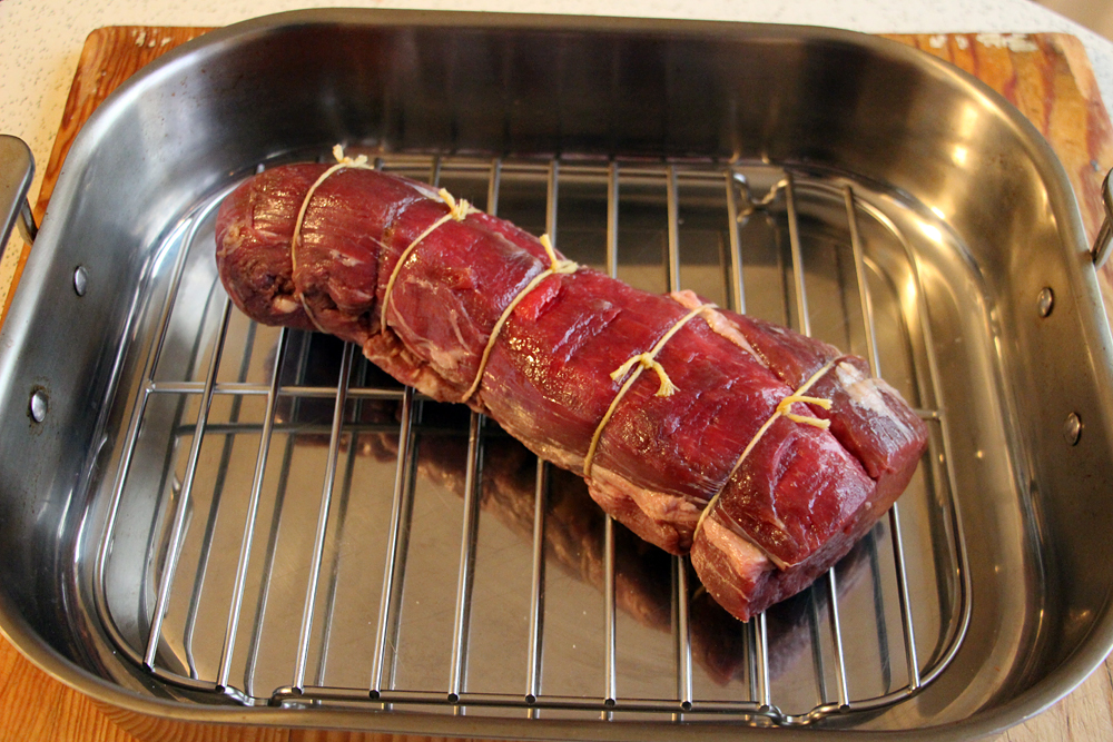 Arrange a wire rack in a shallow roasting pan just large enough to hold the tenderloin. Photo: Wendy Goodfriend