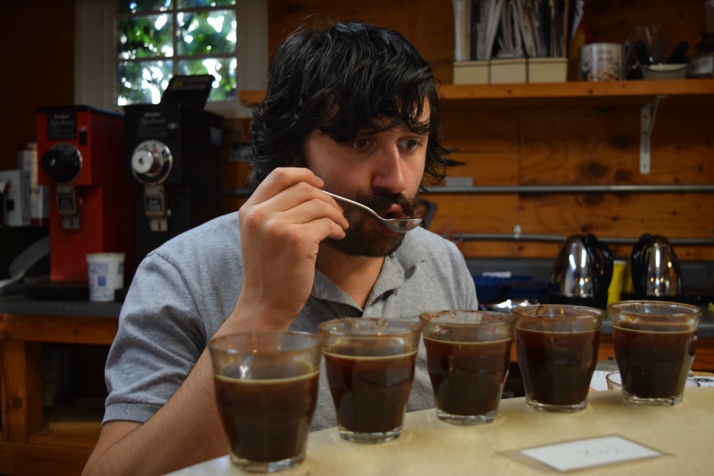 Jason Sarley tastes his coffee. Photo: Shelby Pope