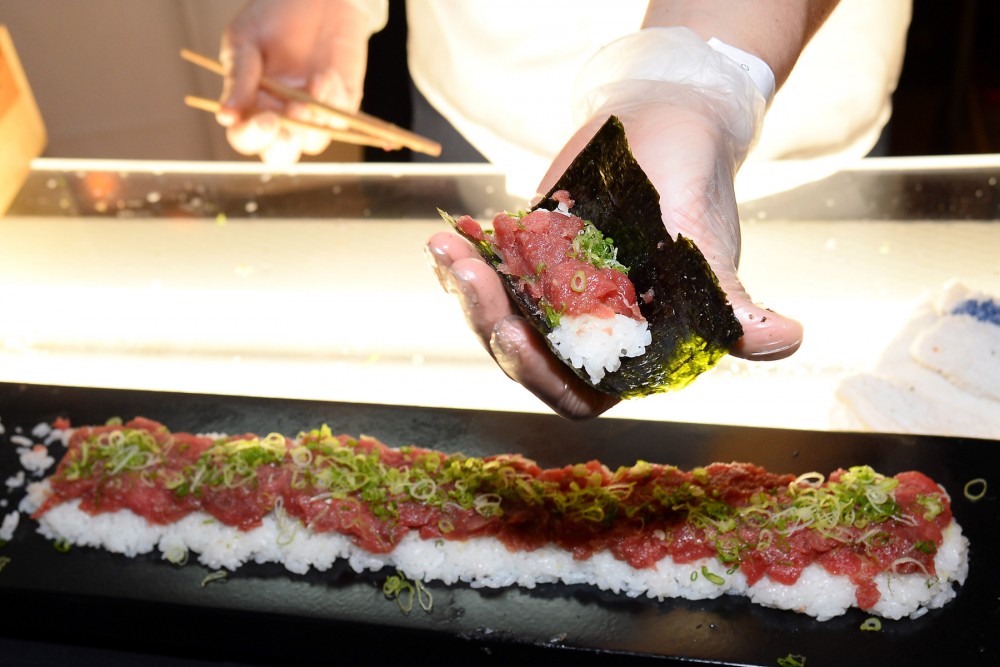 Hand-rolled bluefin tuna sushi is prepared with green onions at Vegas Uncork'd by Bon Appetit's Grand Tasting event in Las Vegas. Photo: Ethan Miller/Getty Images for Vegas Uncork'd