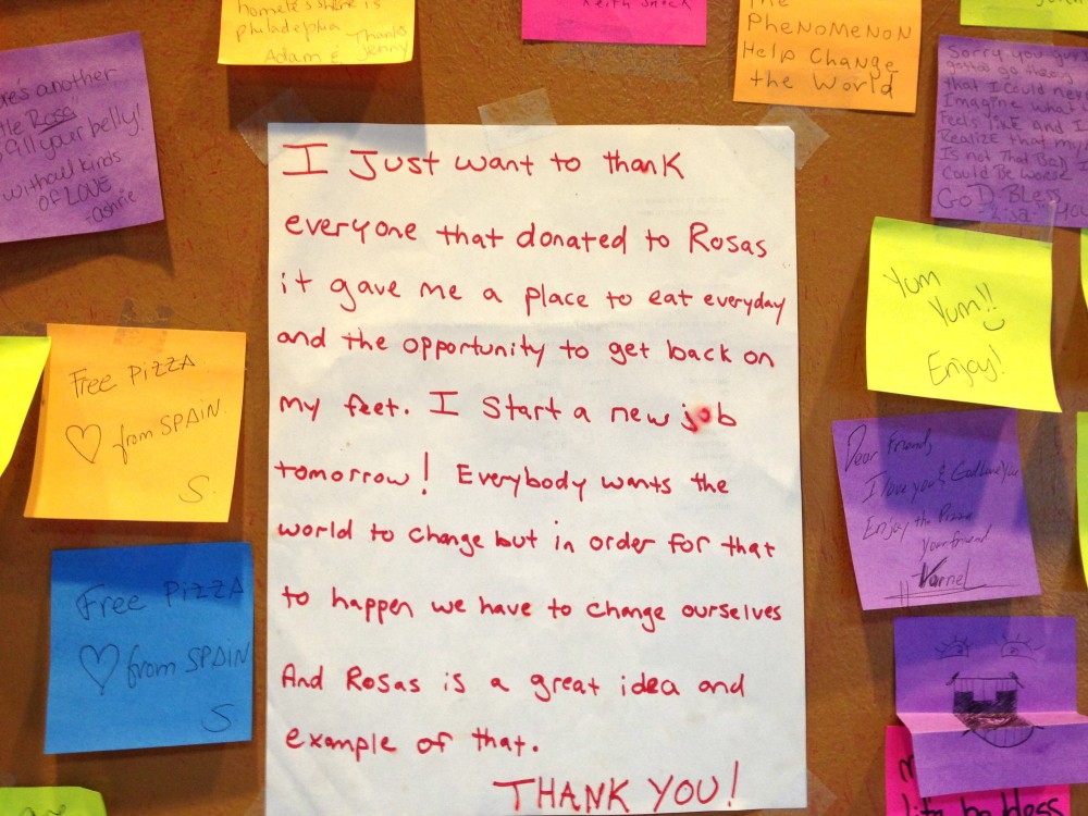 Messages adorn the walls of a Philadelphia pizza shop where customers pay an extra $1 to feed a person who is homeless. Photo: Courtesy of Mason Wartman