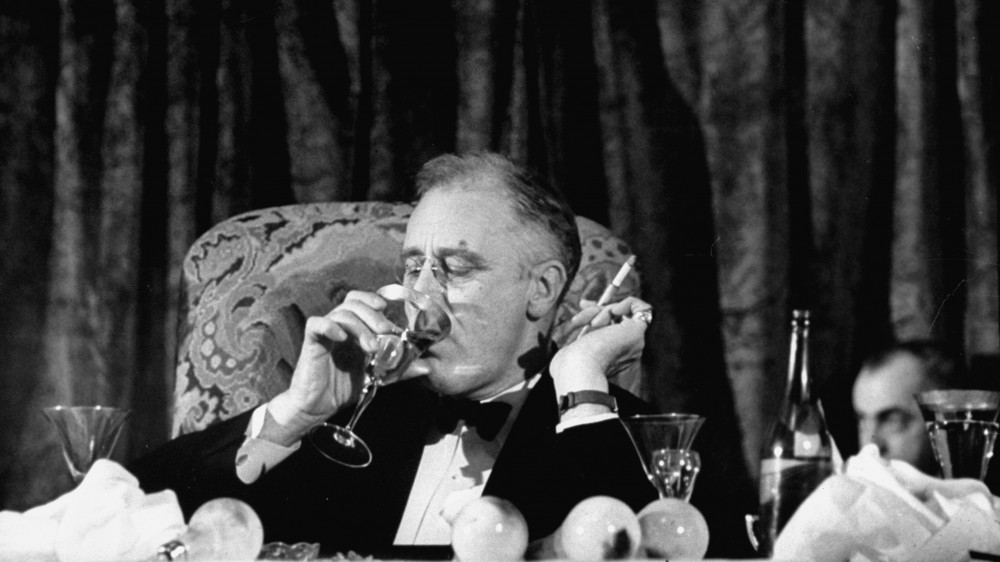 President Franklin Delano Roosevelt drinks a glass of wine at a fundraising dinner in 1938. FDR fancied himself quite the skilled mixologist; many of his colleagues disagreed. Photo: Thomas D. McAvoy/The LIFE Picture Collection/Getty Images