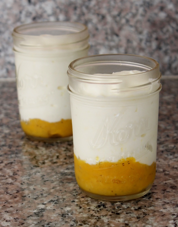 Place two to three tablespoons mango mixture on the bottom of a half-pint jar and top with yogurt. Photo: Kate Williams