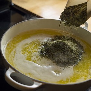 Making CannaButter. Photo courtesy of Feastly