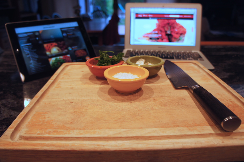 A tablet, computer, and smartphone are becoming helpful kitchen tools. Photo: Angela Johnston