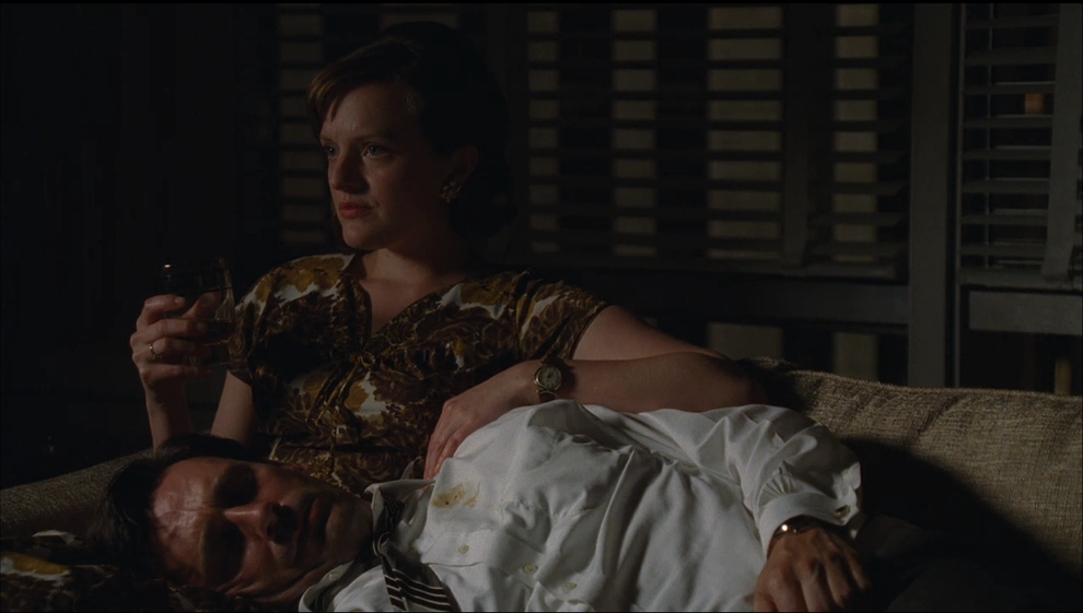 Peggy Olson (Elisabeth Moss) cares for a drunk Don (Jon Hamm.) Photo: AMC 