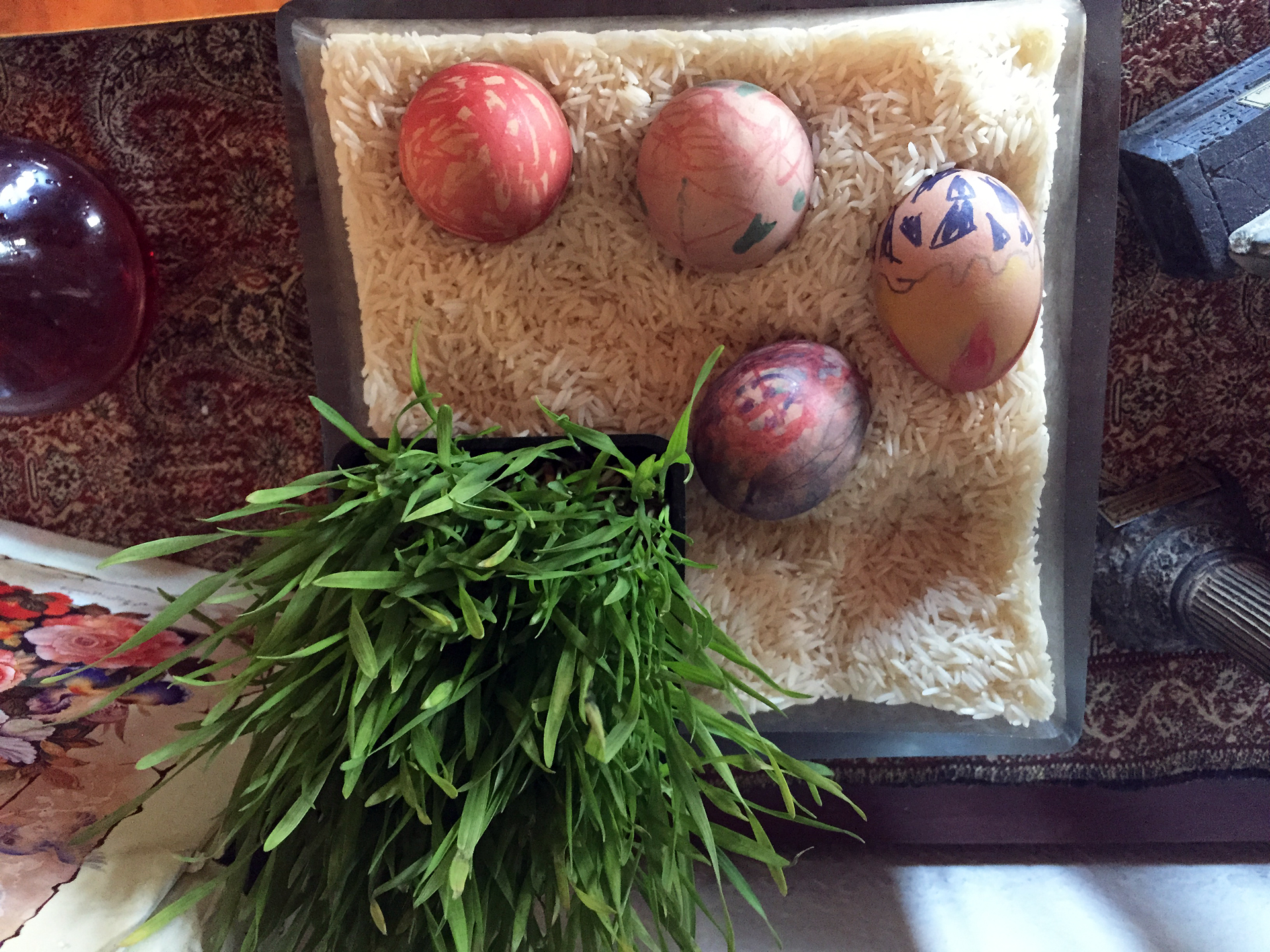 Eggs, which weren't a part of the original haftsin table, symbolize symbolize fertility.