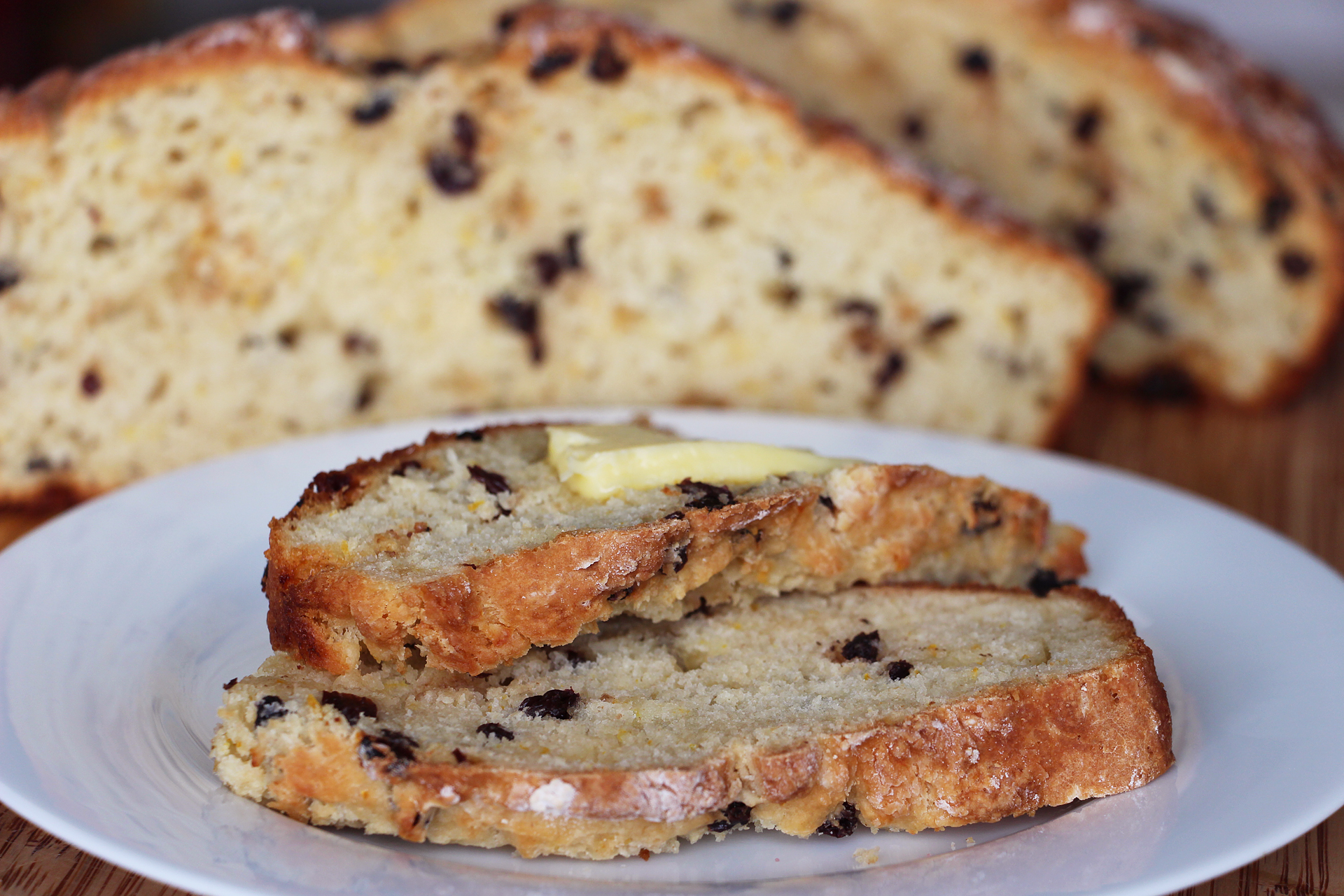 Sliced and buttered Irish-American Soda Bread with Currants and Orange Zest. Photo: Wendy Goodfriend