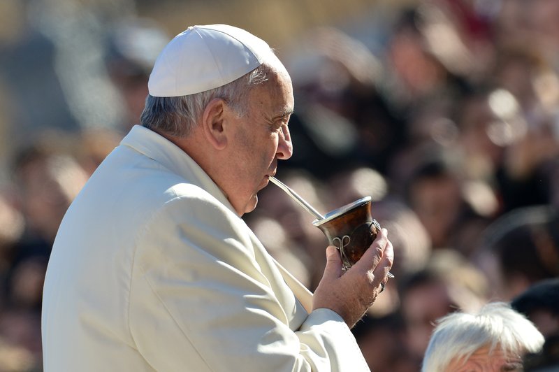 Pope Francis sips his mate as he arrives for his general audience at St. Peter's Square in December. Photo: Alberto Pizzoli/AFP/Getty Images