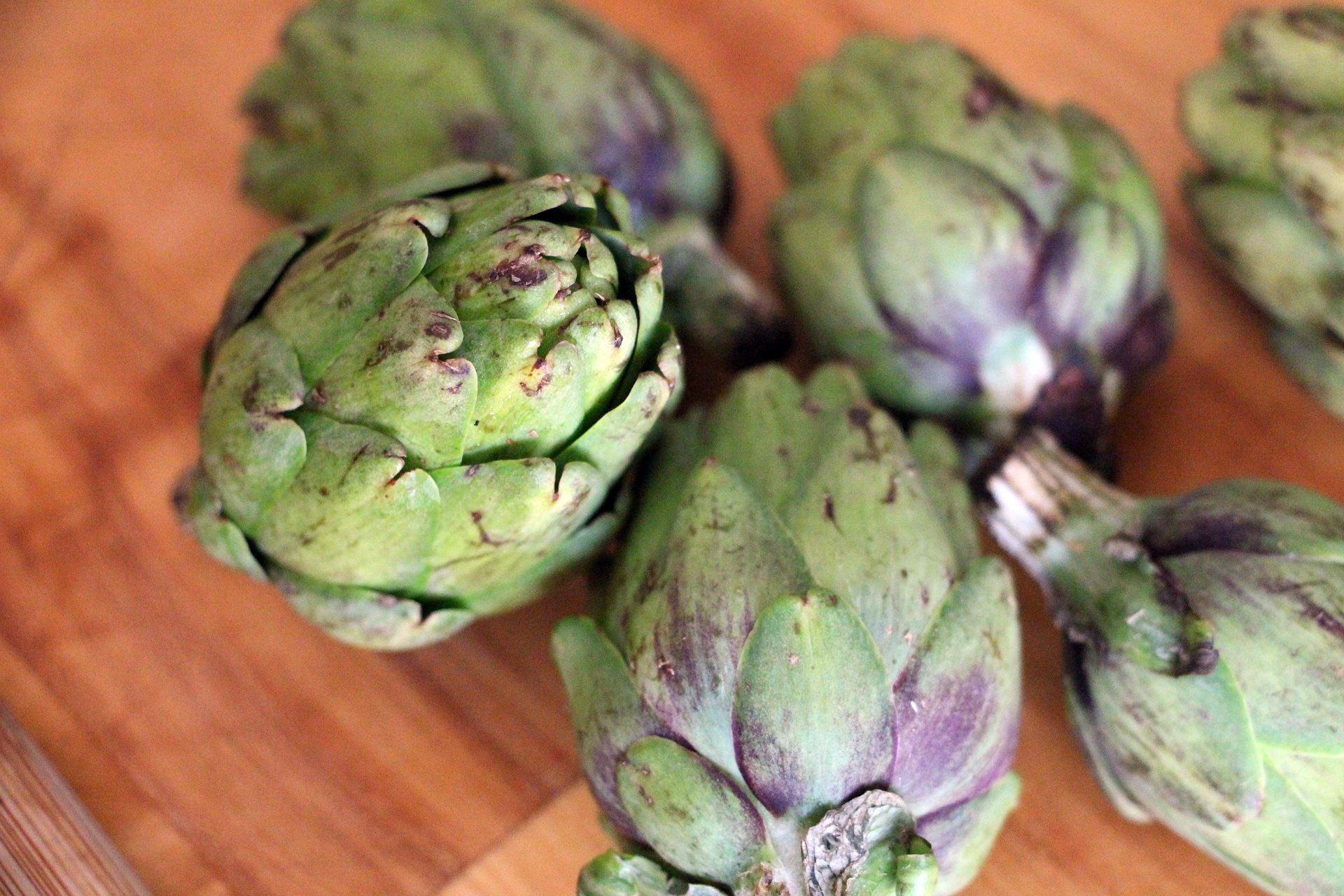 Start with whole baby artichokes.