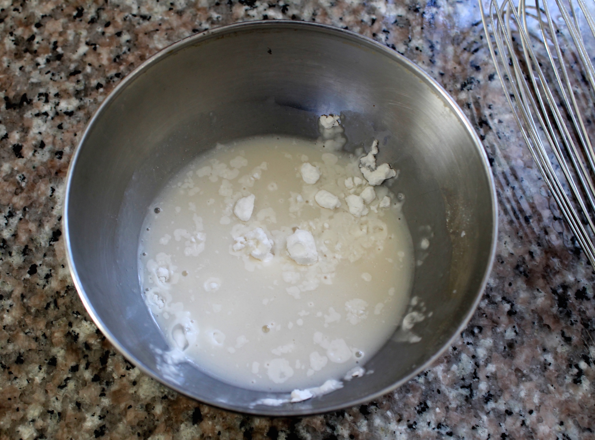 Tapioca needs to be stirred into a slurry before being added to the hot milk to keep the yogurt lump-free.