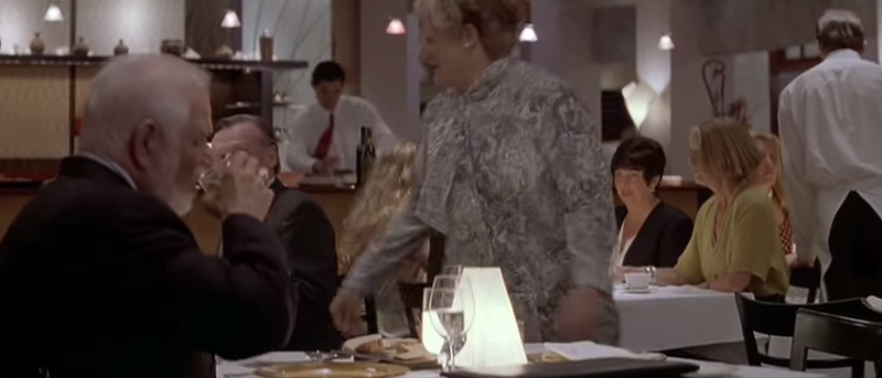 Robin Williams in character as the eponymous Mrs Doubtfire, dining at Bridges in Danville