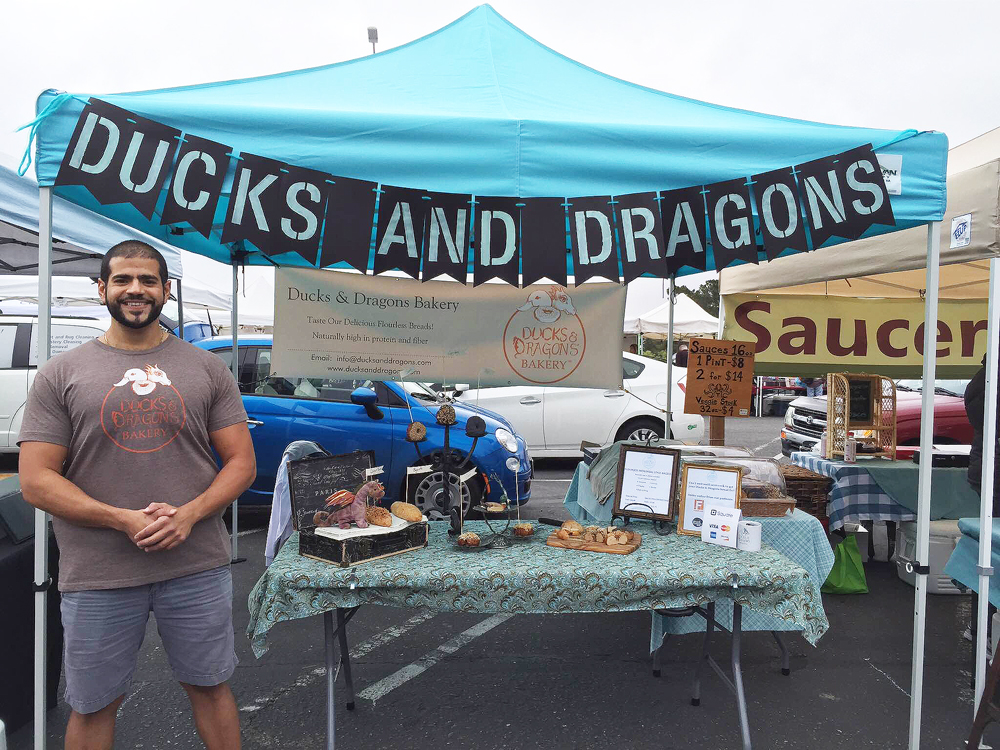 Makram is all smiles at his first farmers market stand, this one at the College of San Mateo.