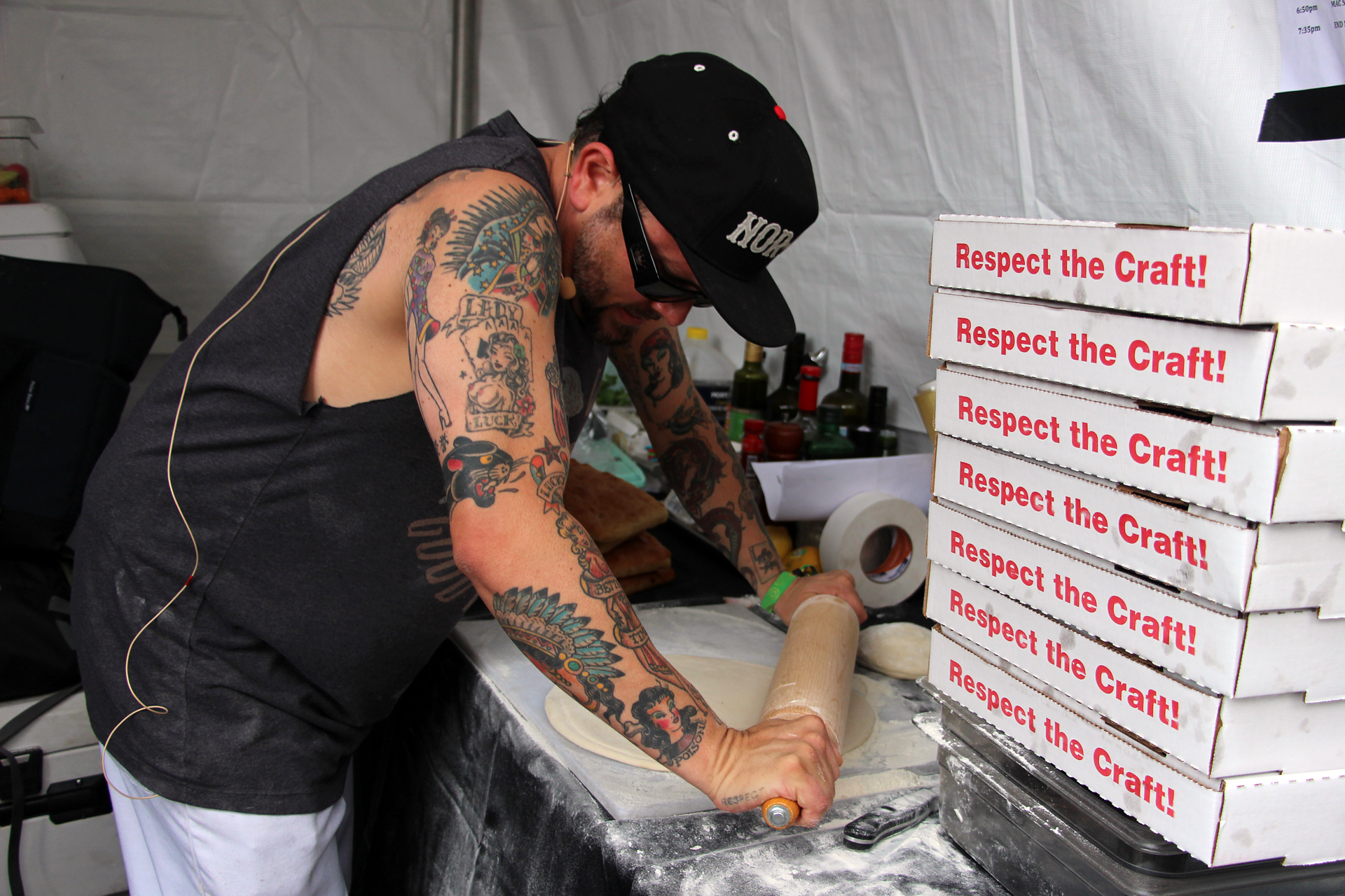 Tony Gemignani rolling and prepping the dough for his pizza performance.