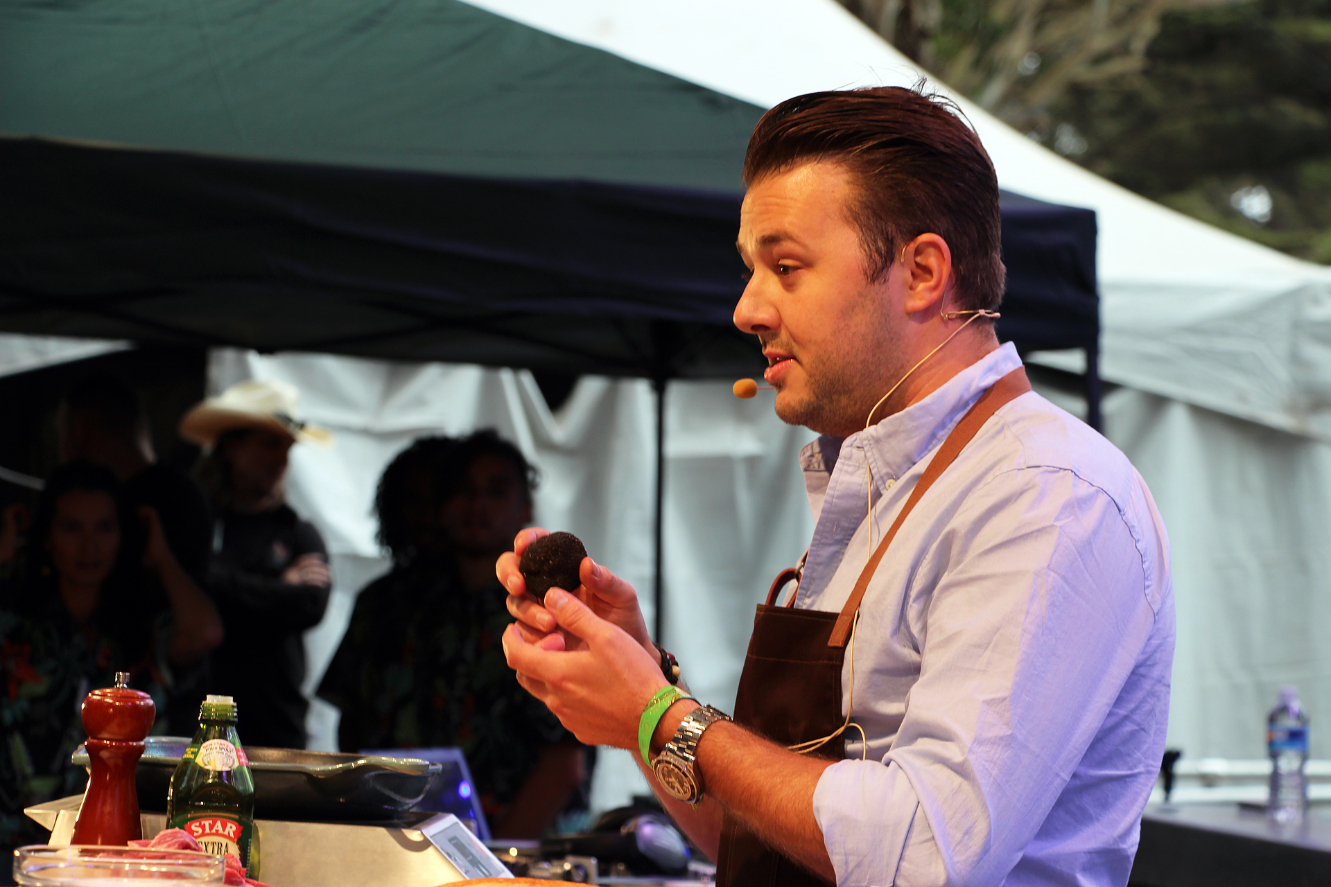 Chef Adam Sobel of San Francisco’s MINA Test Kitchen holds a prized black truffle.