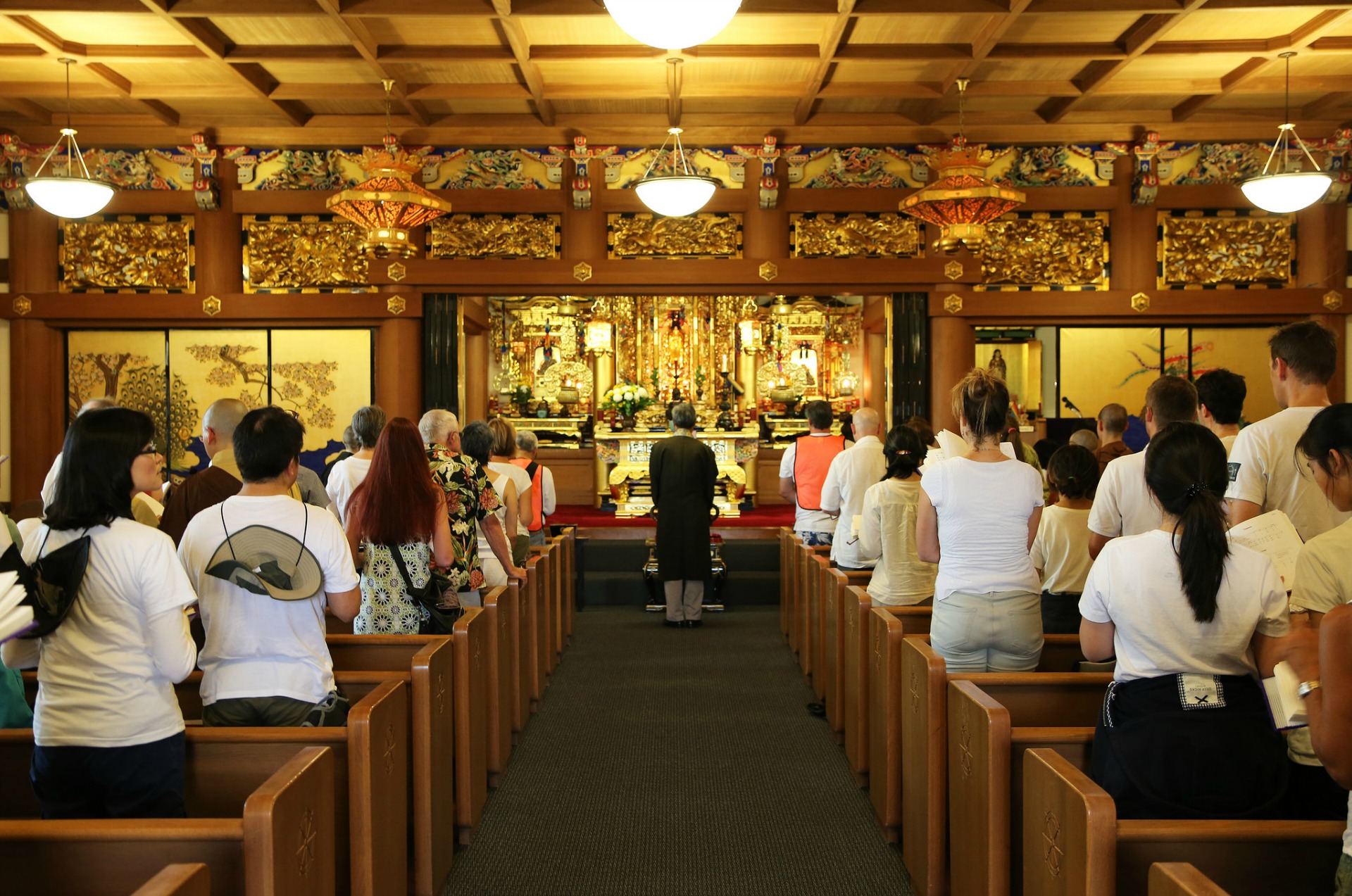 Last year's group at the Buddhist Church of San Francisco, where Rev. Ronald K. Kobata is leading them in devotional chanting