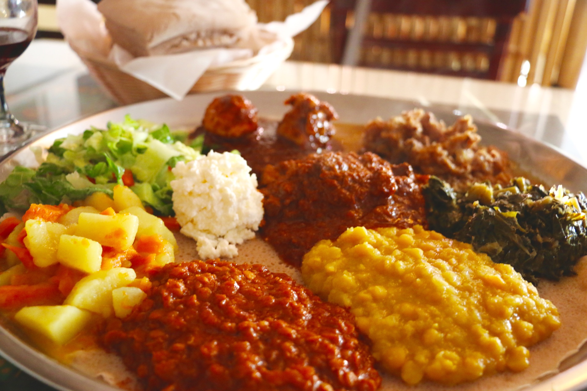 Addis' meat and vegetable combination plates served on one platter.