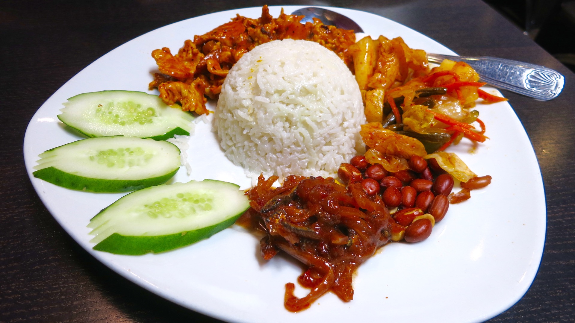 Chilli Padi's nasi lemak is a spicy melange of salty, fishy and savory flavors.