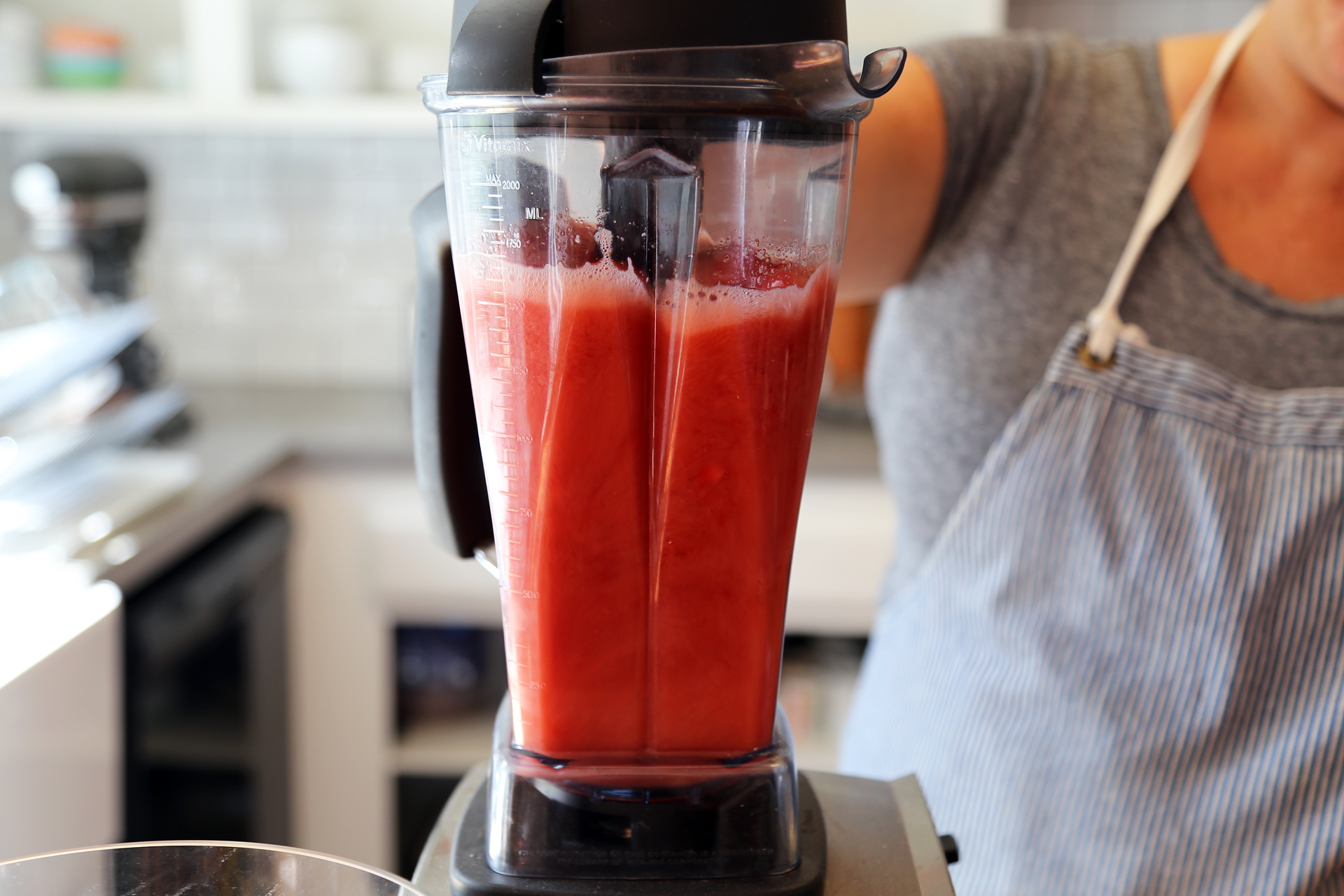 In a blender, blend together the strawberries with the cranberry juice until smooth.