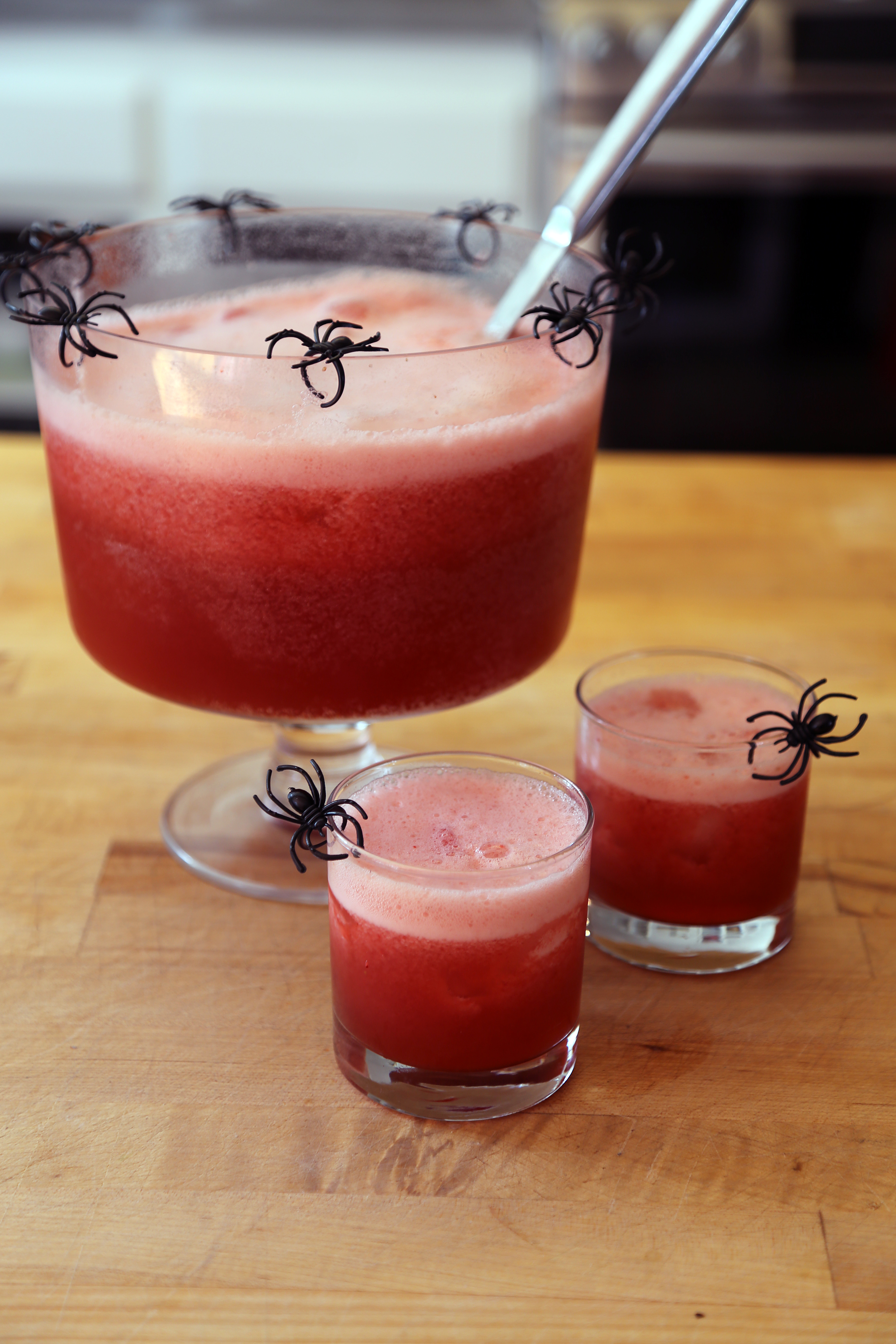 Add the ice cubes and garnish the bowl with terrifying creatures of the night. Serve.
