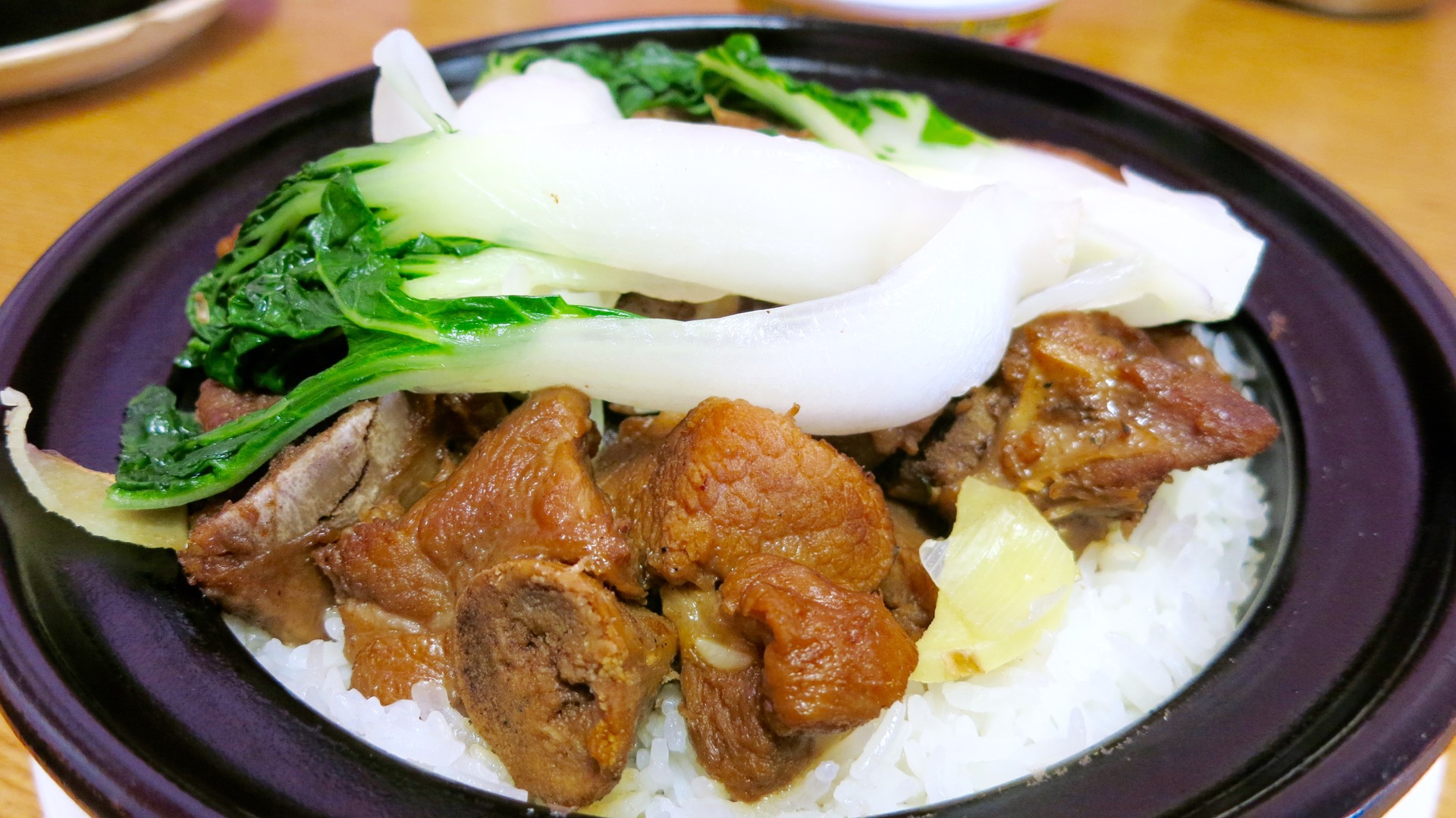 Gum Wah's pork spareribs in black bean sauce over sticky rice is an affordable and filling lunch.