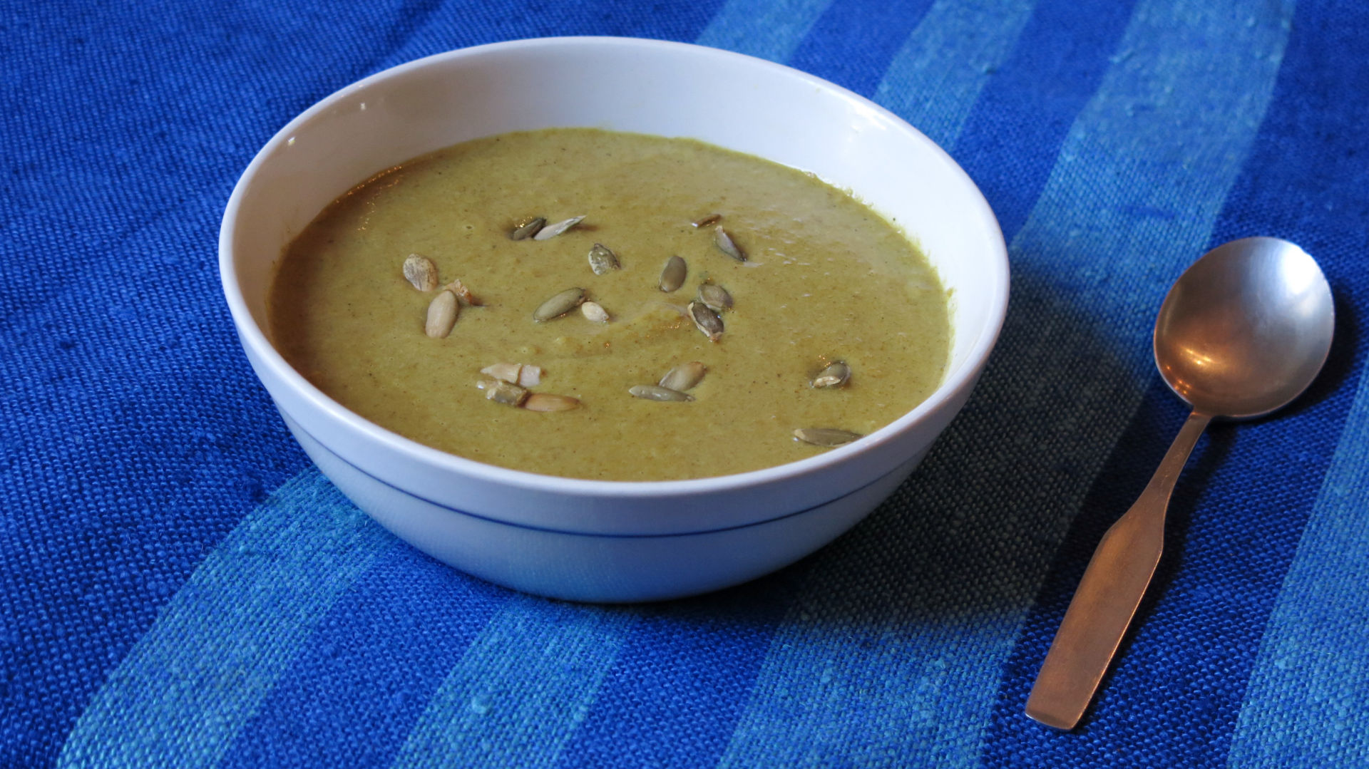 Adding coconut milk to curried pumpkin soup will give you very good results.