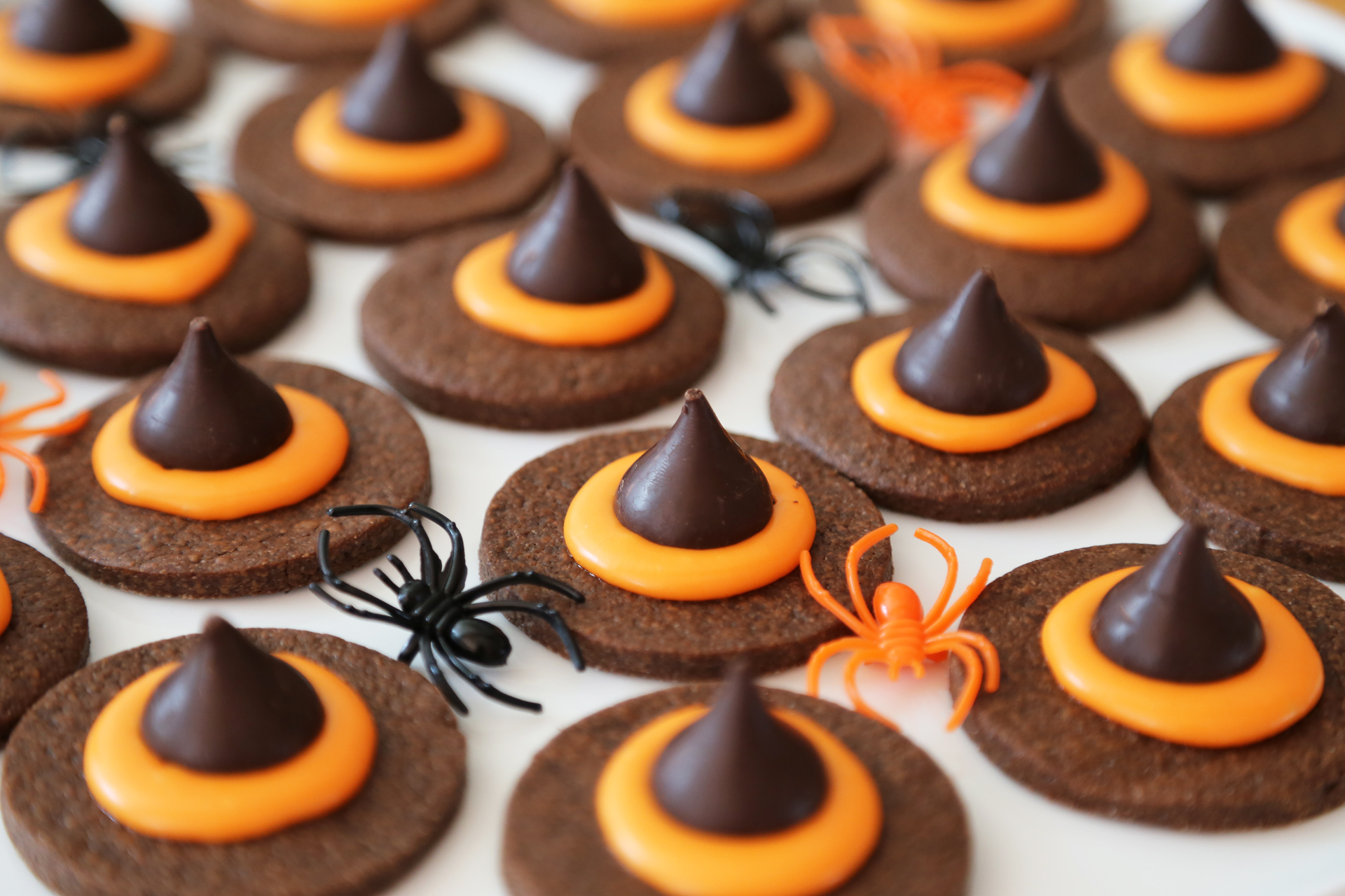 Serve the Wicked Witch Hat Cookies with spiders.