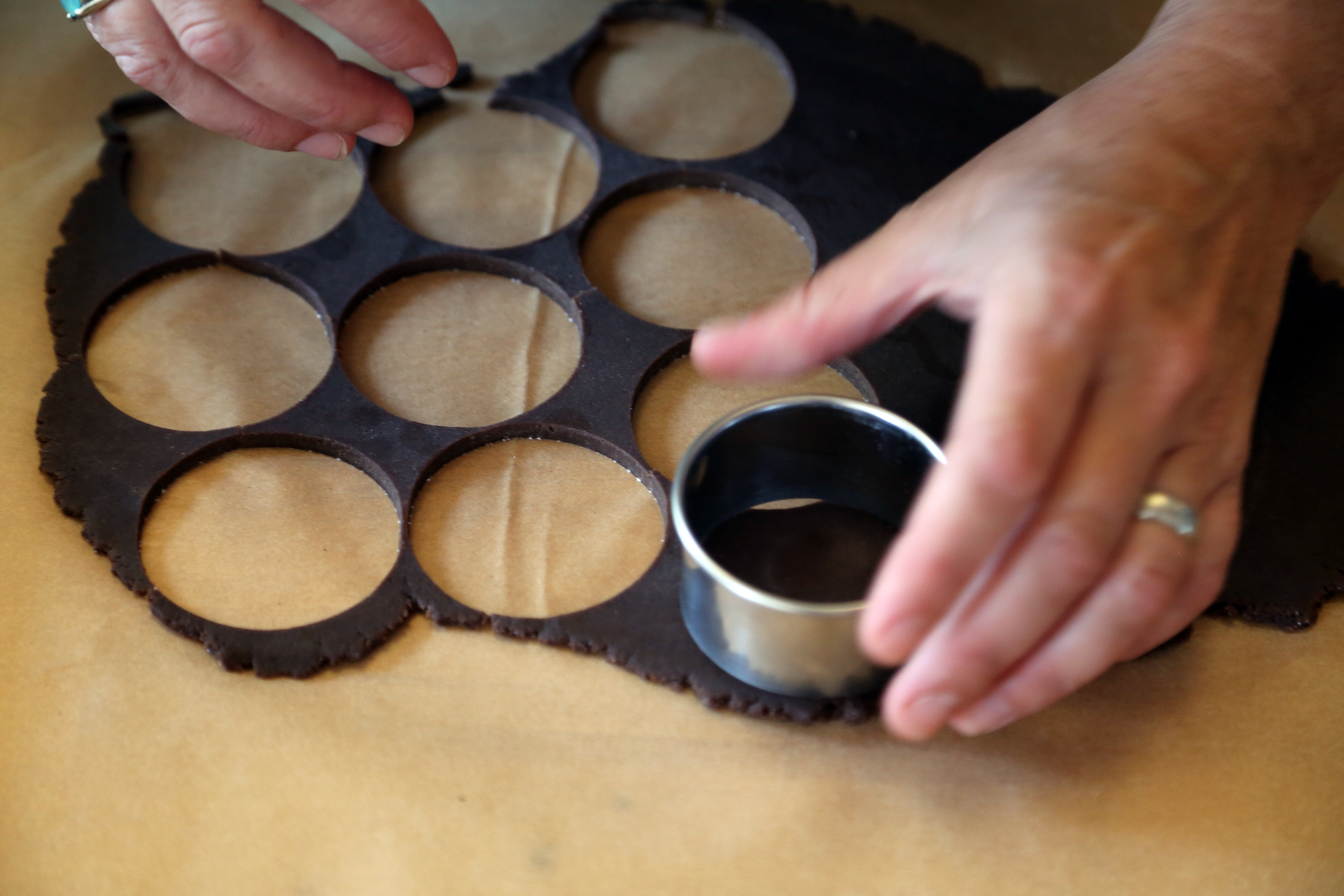 Using a round 2 1/4-inch cookie cutter, cut out as many rounds as possible.