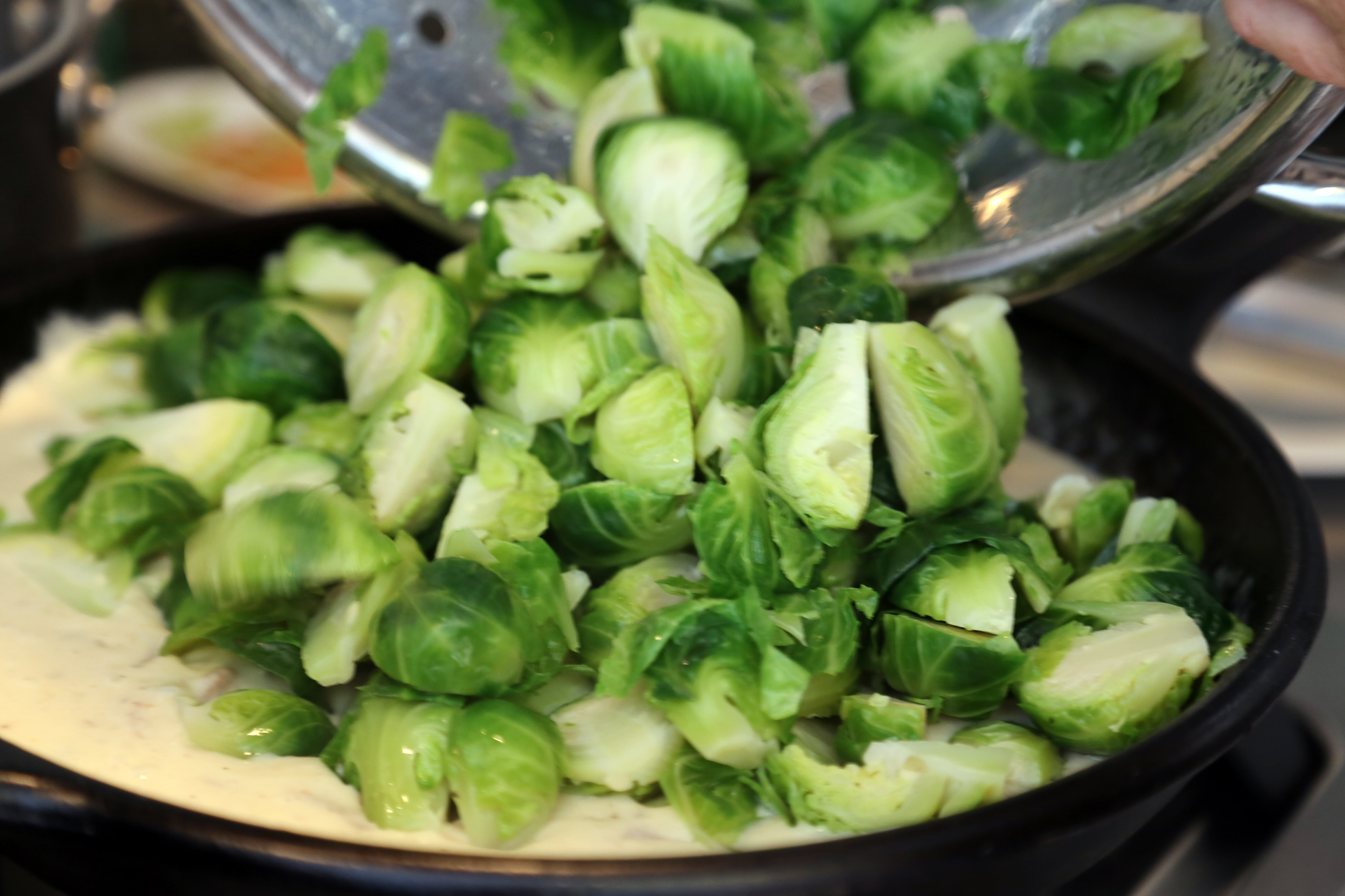 Add the Brussels sprouts to the sauce and stir to combine. 