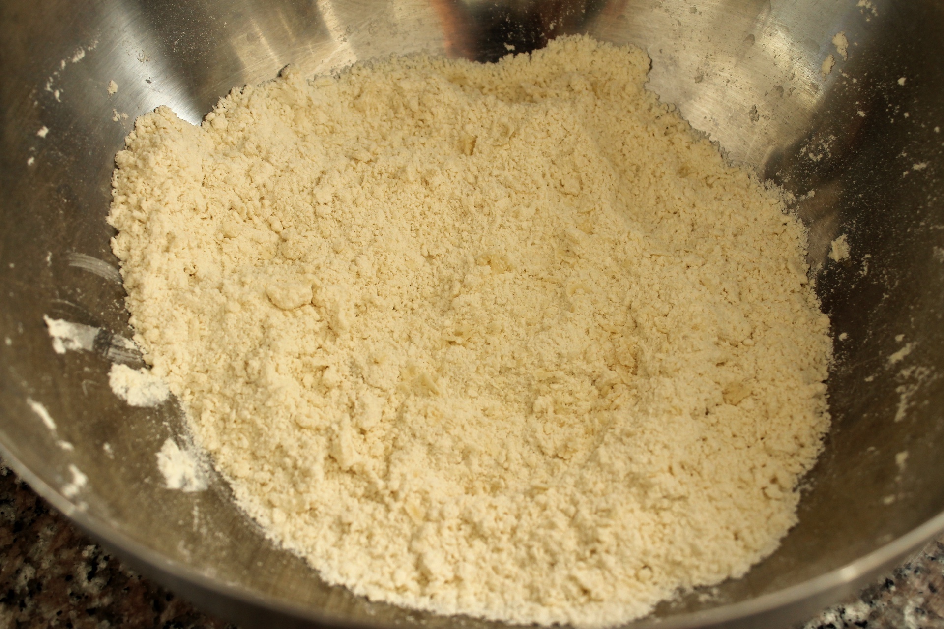Rub the lard evenly into the flour.