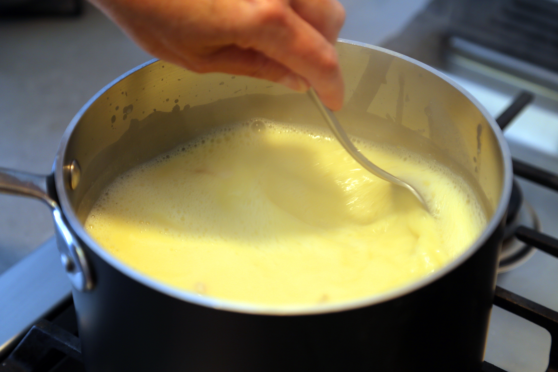 Whisk the mixture back to the simmering broth. Stir with the whisk until the soup becomes thickens, 1 to 2 minutes.