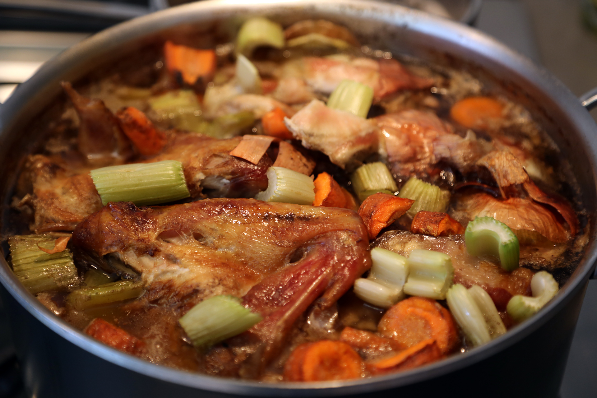 Reduce the heat to low and let simmer, partially covered, for 3 hours.