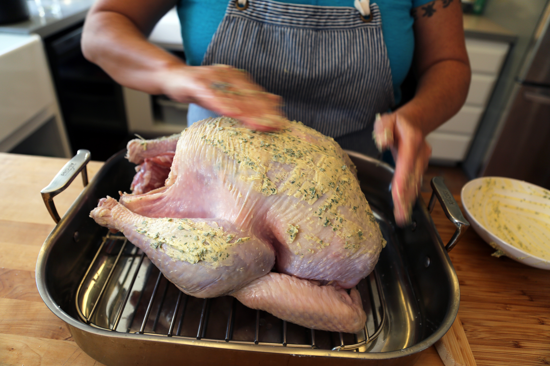 Rub that bird all over with a herb-infused butter, inside and out and under and over the skin.