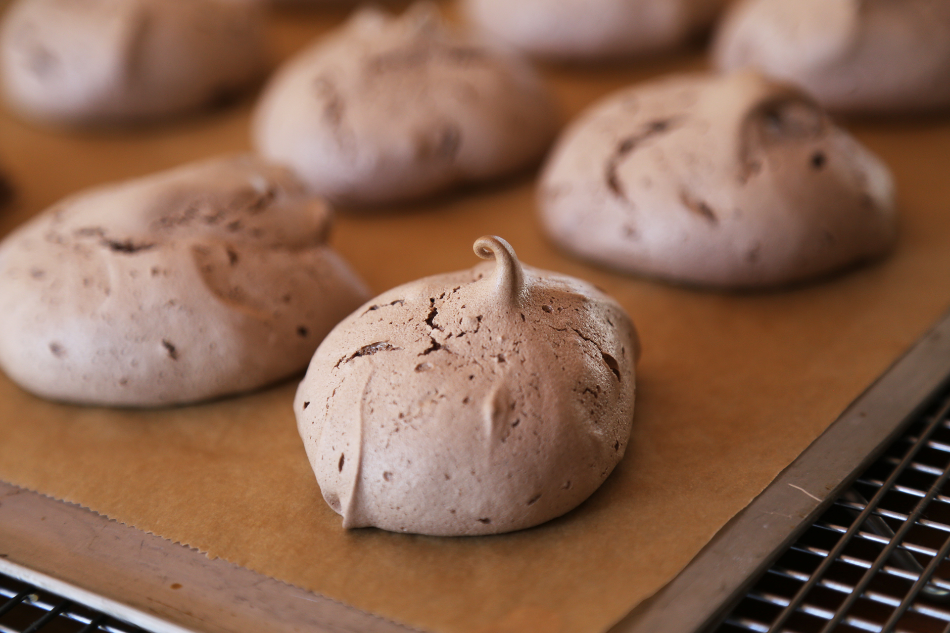 Gluten-Transfer the meringues with their parchment to wire racks and let cool completely.